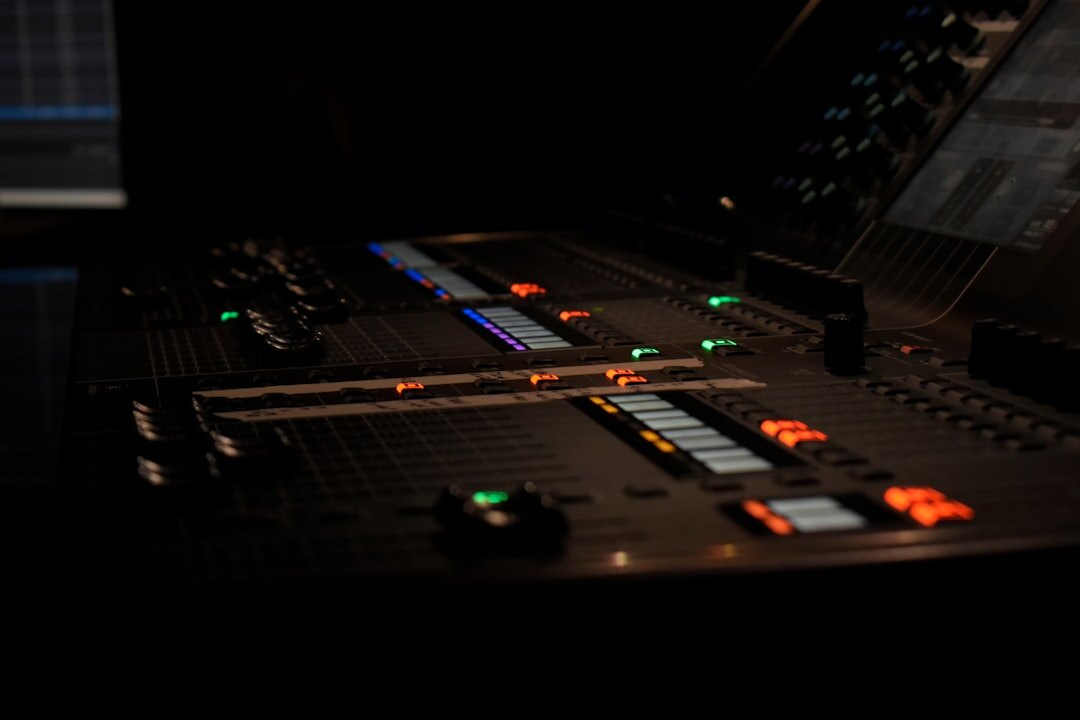 Automated video production switcher panel with glowing controls